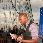 Poet Terrance Hayes reads "Juke Box Love Song" by Langston Hughes under the first arch of the Brooklyn Bridge